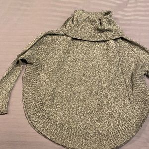 Tunic style turtle neck sweater